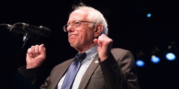 Democratic presidential candidate Bernie Sanders gestures while speaking at a campaign rally, March 23, 2016 at the Wiltern Theater in Los Angeles, California. / AFP / ROBYN BECK (Photo credit should read ROBYN BECK/AFP/Getty Images)