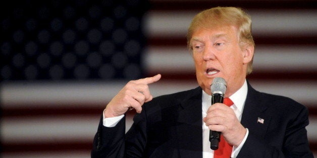 Republican U.S. presidential candidate Donald Trump speaks at a town hall event in Appleton, Wisconsin, March 30, 2016. REUTE