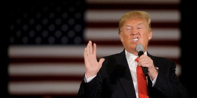 Republican U.S. presidential candidate Donald Trump speaks at a town hall event in Appleton, Wisconsin, March 30, 2016. REUTE