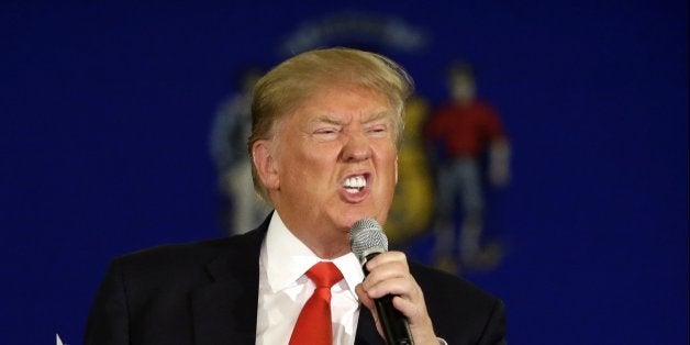 Republican presidential candidate Donald Trump reacts as he speaks at a campaign stop Wednesday, March 30, 2016, in Appleton,