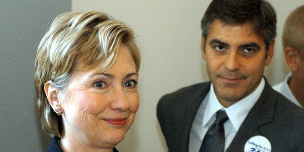 UNITED STATES - SEPTEMBER 17: Actor George Clooney and Sen. Hillary Clinton, D-NY, on the way to a United Way press conference in support of the Calling for 211 Act of 2003. The act supports the creation of a 211 hotline for community and volunteer services. (Photo By Chris Maddaloni/Roll Call/Getty Images)