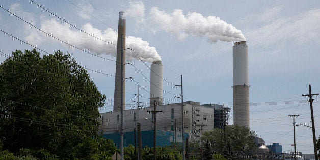 DTE Energy Co.'s Monroe Power Plant stands in Monroe, Michigan, U.S., on Monday, June 30, 2014. DTE Energy's Monroe plant is the first coal-fired power plant in Michigan to use scrubbers, which reduce sulfur dioxide emissions by about 97 percent, according to a company press release. Photographer: Jeff Kowalsky/Bloomberg via Getty Images