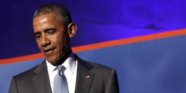 U.S. President Barack Obama arrives at the awards dinner for Syracuse University's Toner Prize for Excellence in Political Re