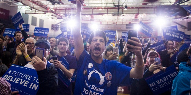 SHEBOYGAN, WI - APRIL 1: People cheer as democratic presidential candidate, Sen. Bernie Sanders and his wife Jane O'Meara San