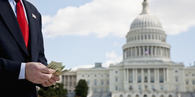 A politician counting money in front of the US Capitol Building