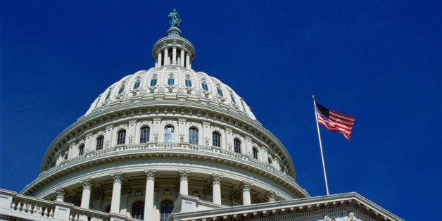 WASHINGTON, UNITED STATES - JANUARY 01: The stars and stripes flag flying at the Capitol Building, Washington, USA.