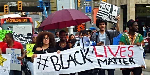 Black Lives Matter protesters march through the streets of Ottawa on May 30, 2015. Photo: OBERT MADONDO/The Canadian Progressive