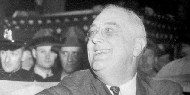 UNITED KINGDOM - NOVEMBER 08: A picture just received in London of America's third-term President, Mr Franklin D. Roosevelt, as he gripped the hand of an old friend, former Postmaster General James A. Farley, at Madison Square Garden, New York. Mr Farley sat on the platform while the President made a campaign speech attacking the Republicans whom Mr Roosevelt accused of playing politics with the national security. (Photo by Planet News Archive/SSPL/Getty Images)