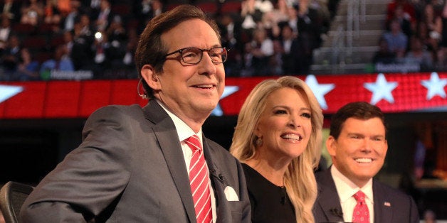 Fox News Channel debate moderators (L-R), Chris Wallace, Megyn Kelly and Brett Baier, start the first official Republican presidential candidates debate of the 2016 U.S. presidential campaign in Cleveland, Ohio, August 6, 2015. REUTERS/Aaron Josefczyk