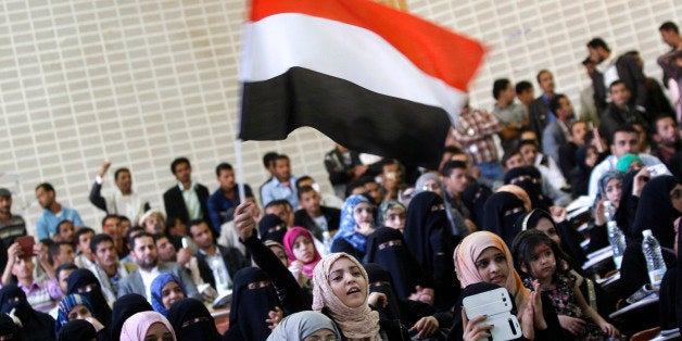 A Yemeni girl, center, waves her national flag as she chants slogans during a ceremony to mark the second anniversary of the start of the revolution in Yemen in 2011, in Sanaa, Yemen, Tuesday, Jan. 15, 2013. The 2011 Yemeni Revolution was as an extension of the Arab Spring which has toppled three dictators to date. Yemenis were able to create a unique revolution, their struggle came peacefully, unarmed, and lead by women and youth. (AP Photo/Hani Mohammed)