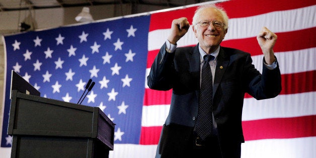 U.S. Democratic presidential candidate and U.S. Senator Bernie Sanders takes the stage at a campaign rally in a hockey rink at Monroe Community College in Rochester, New York April 12, 2016. REUTERS/Brian SnyderTPX IMAGES OF THE DAY