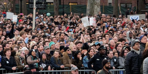 NEW YORK, NEW YORK - APRIL 13: Attendees await the start of a campaign event for Democratic presidential candidate U.S. Senator Bernie Sanders (not pictured) at Washington Square Park on April 13, 2016 in New York City. (Photo by D Dipasupil/WireImage)