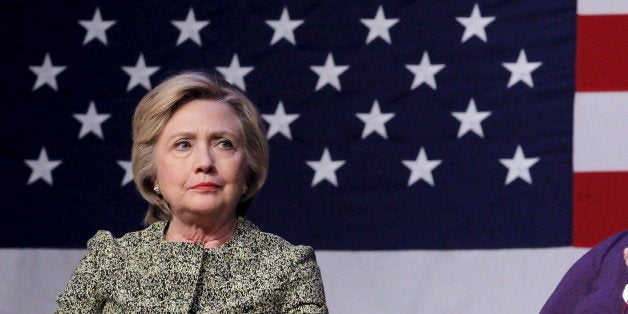 Democratic U.S. presidential candidate Hillary Clinton listens to the family members of victims of gun violence speak during a panel in Port Washington, New York April 11, 2016. REUTERS/Lucas Jackson 