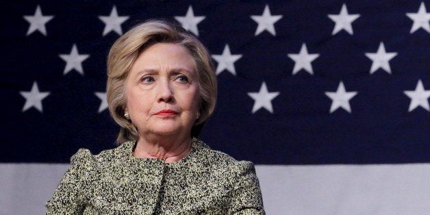 Democratic U.S. presidential candidate Hillary Clinton listens to the family members of victims of gun violence speak during a panel in Port Washington, New York April 11, 2016. REUTERS/Lucas Jackson 