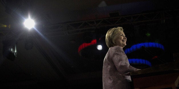 Hillary Clinton, former Secretary of State and 2016 Democratic presidential candidate, smiles during an election night party in New York, U.S., on Tuesday, April 19, 2016. Clinton's victory makes her march to the nomination over Vermont Senator Bernie Sanders all but unstoppable. Photographer: John Taggart/Bloomberg via Getty Images 