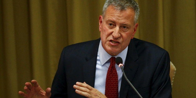 New York City Mayor Bill de Blasio speaks during the "Modern Slavery and Climate Change" meeting at the Vatican July 21, 2015. Mayors and governors from major world cities on Tuesday will urge global leaders to take bold action at this year's U.N. climate change summit, saying it may be the last chance to tackle human-induced global warming. Pope Francis has invited some 65 local and regional leaders to attend a two-day conference on how cities can address what the Vatican calls the "interconnected emergencies" of climate change and human trafficking. REUTERS/Tony Gentile 