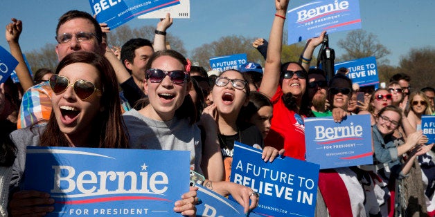Supporters cheer as Democratic presidential candidate Bernie Sanders, I-Vt., speaks during a campaign rally in Prospect Park,