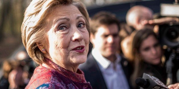 CHAPPAQUA, NY - After casting her vote on New York state primary day, former Secretary of State Hillary Clinton, along with her husband President Bill Clinton, greets friends and supporters at a polling place in Chappaqua, New York on Tuesday April 19 2016. (Photo by Melina Mara/The Washington Post via Getty Images)