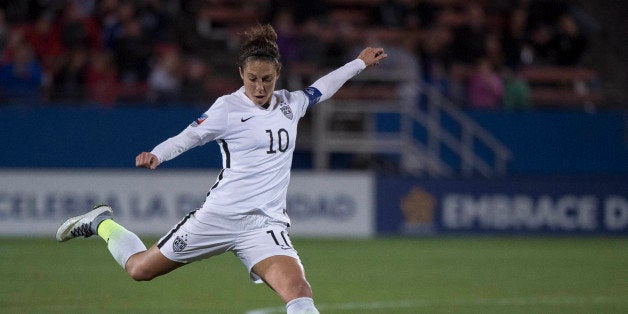 Feb 10, 2016; Frisco, TX, USA; United States midfielder Carli Lloyd (10) shoots the ball on the Costa Rica goal during the second half at Toyota Stadium. United States defeats Costa Rica 5-0. Mandatory Credit: Jerome Miron-USA TODAY Sports