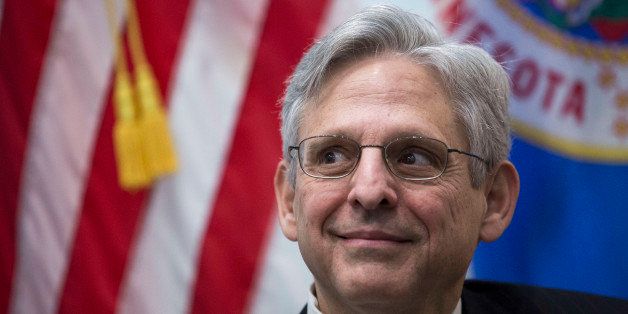 WASHINGTON, DC - MARCH 30: U.S. Supreme Court nominee Merrick Garland looks on during a photo opportunity before a private meeting with Sen. Al Franken (D-MN) in Franken's office on Capitol Hill, March 30, 2016 in Washington, DC. Yesterday, Senator Mark Kirk (R-IL) became the first Republican lawmaker to meet with Garland, who was nominated by President Obama to fill the Supreme Court vacancy created by the death of Antonin Scalia. (Photo by Drew Angerer/Getty Images)