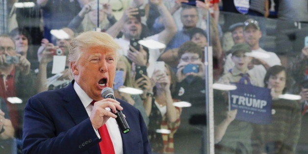U.S. Republican presidential candidate Donald Trump speaks to supporters during a campaign rally at Mid-Hudson Civic Center i