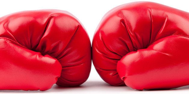 red boxing gloves isolated on...