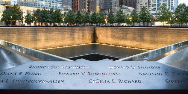 September 11 Memorial Pool with several skyscrapers in the background, New York City.