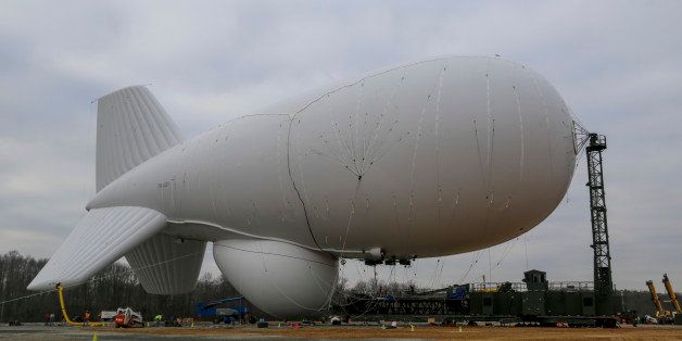 ABERDEEN, MD - DECEMBER 15: In this handout from the U.S. Army, Joint Land Attack Cruise Missile Defense Elevated Netted Sensor System (JLENS) personnel oversee the inflation of an aerostat at December 15, 2014. in Aberdeen Proving Ground, Maryland. According to reports October 28, 2015, an unmanned Army surveillance blimp broke loose from a ground tether at the Aberdeen Proving Ground, Maryland and is currently drifting over Pennsylvania. (Photo by U.S. Army Photo /Ronald Sellinger via Getty Images)