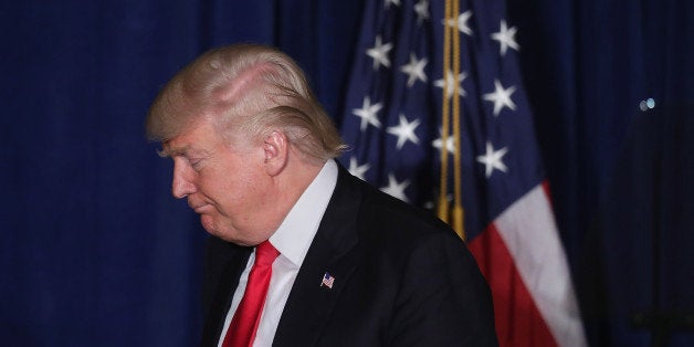 WASHINGTON, DC - APRIL 27: Republican presidential candidate Donald Trump leaves the stage after delivering a speech about his vision for foreign policy at the Mayflower Hotel April 27, 2016 in Washington, DC. A real estate billionaire and reality television star, Trump beat his GOP challengers by double digits in Tuesday's presidential primaries in Pennsylvania, Maryland, Deleware, Rhode Island and Connecticut. 'I consider myself the presumptive nominee, absolutely,' Trump told supporters at the Trump Tower following yesterday's wins. (Photo by Chip Somodevilla/Getty Images)