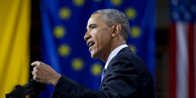 U.S President Barack Obama speaks in front of the European Union Flag at the Hannover Messe Trade Fair in Hannover, Germany, Monday April 25, 2016. Obama is on a two-day official visit to Germany. (AP Photo/Carolyn Kaster)