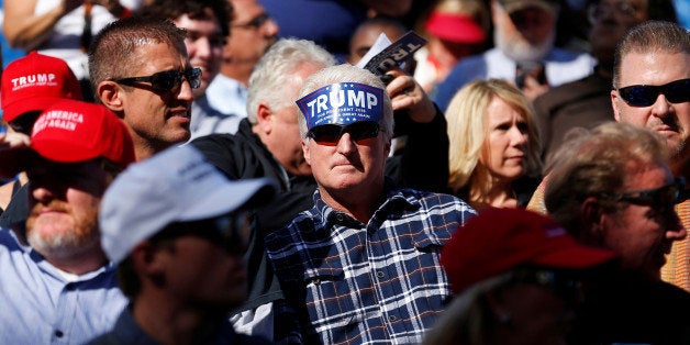 Supporters of Republican U.S. presidential candidate Donald Trump gather for a campaign rally in Costa Mesa, California April 28, 2016. REUTERS/Mike Blake 