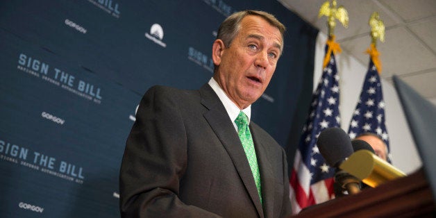 FILE - In this Oct. 21, 2015 file photo, House Speaker John Boehner of Ohio speaks during a news conference on Capitol Hill in Washington. Lawmakers are pushing to finalize a sweeping deal to fund the federal government before Boehner leaves Congress at the end of this week. (AP Photo/Evan Vucci, File)