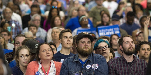 Attendees listen during a campaign event for Senator Bernie Sanders, an independent from Vermont and 2016 Democratic presidential candidate, not pictured, in Huntington, West Virginia, U.S., on Tuesday, April 26, 2016. Sanders' single win in Rhode Island out of the five contests held on Tuesday puts his opponent Hillary Clinton on the brink of the Democratic presidential nomination. Photographer: Ty Wright/Bloomberg via Getty Images