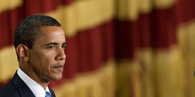 US President Barack Obama delivers his landmark address to the Muslim world on June 4, 2009 in the Grand Hall of Cairo University in Cairo. Obama vowed to forge a 'new beginning' for Islam and America in a speech to the world's Muslims, evoking a vision of peace after a smouldering cycle of 'suspicion and discord.' AFP PHOTO/SAUL LOEB (Photo credit should read SAUL LOEB/AFP/Getty Images)