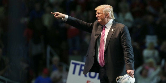 CHARLESTON, WV - MAY 05: Republican Presidential candidate Donald Trump points to supporters following his speech at the Char