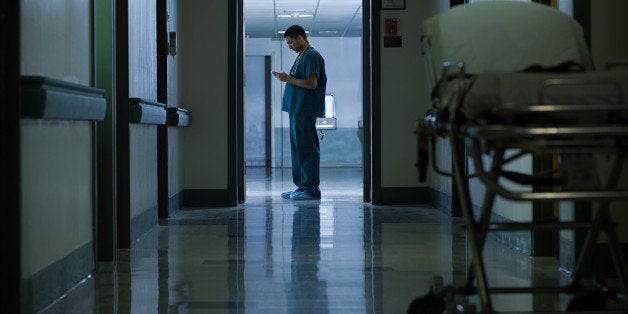 Male doctor in hospital corridor