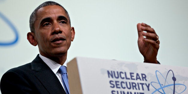 WASHINGTON, DC - APRIL 1: (AFP OUT) President Barack Obama arrives to speak during a closing session at the Nuclear Security