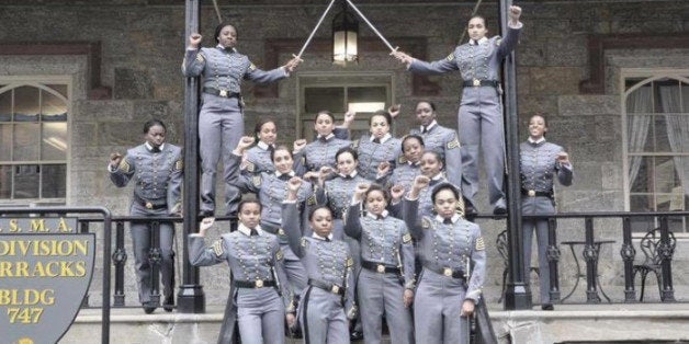 This undated image taken from Twitter shows 16 black, female cadets in uniform with their fists raised while posing for a photograph at the United States Military Academy at West Point, N.Y. The U.S. Military Academy has launched an inquiry into the photo. The image has spurred questions about whether the gesture violates military restrictions on political activity. Spokesman Lt. Col. Christopher Kasker said Saturday, May 7, 2016 that West Point is looking into whether any rules were broken. ( Photo take from Twitter via AP)