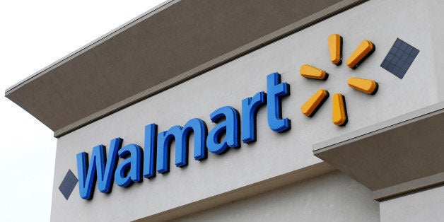 The logo of Down Jones Industrial Average stock market index listed company Walmart is shown on one of its stores in Encinita