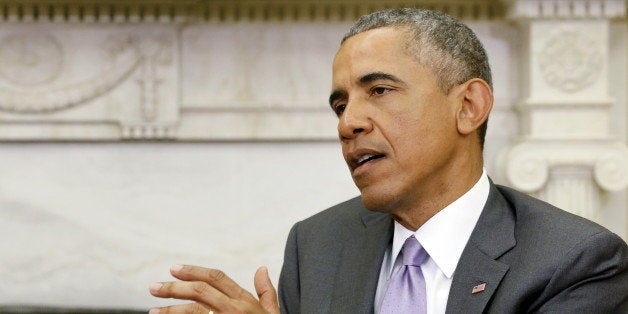 U.S. President Barack Obama (R) delivers remarks to reporters after meeting with Vietnam's Communist Party General Secretary Nguyen Phu Trong in the Oval Office at the White House in Washington July 7, 2015. Trong is Vietnam's first party general secretary to visit the U.S., as Hanoi has strengthened its military relationship with former foe Washington since a territorial dispute with Beijing in the South China Sea has heated up in the past couple of years. REUTERS/Jonathan Ernst