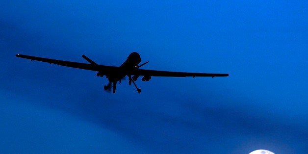 FILE - In this Jan. 31, 2010, file photo, an unmanned U.S. Predator drone flies over Kandahar Air Field, southern Afghanistan
