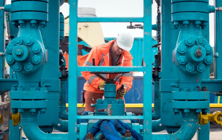 A worker at the Cuadrilla fracking site in Preston New Road, Lancashire, where operations are expected to start this week.<i>