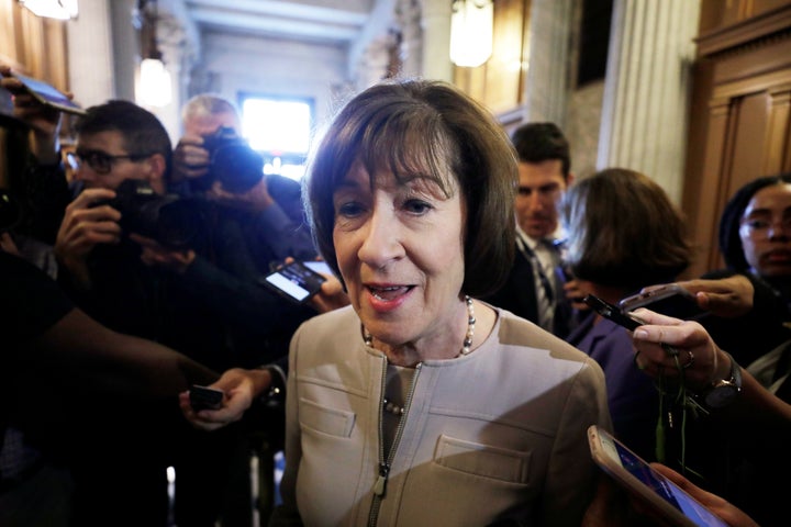 Sen. Susan Collins (R-Maine) talks with reporters as she leaves the floor of the Senate, Oct. 5, 2018.