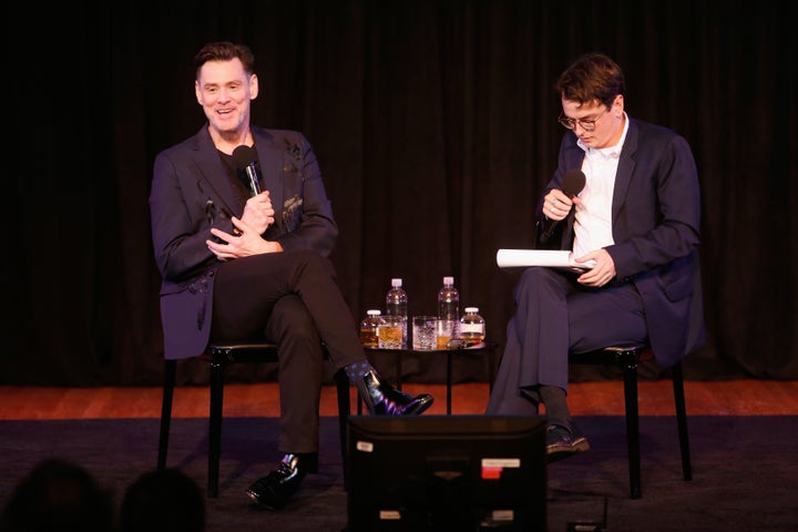 Jim Carrey (left) speaks with The New Yorker's Colin Stokes during the magazine's annual arts and ideas festival, in New York