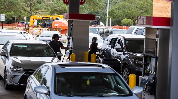 Drivers line up for gasoline as Hurricane Michael bears down on the northern Gulf coast of Florida.