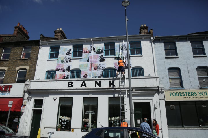 Hoe Street Central Bank in northeast London is printing money to raise funds to buy local payday loan debt.