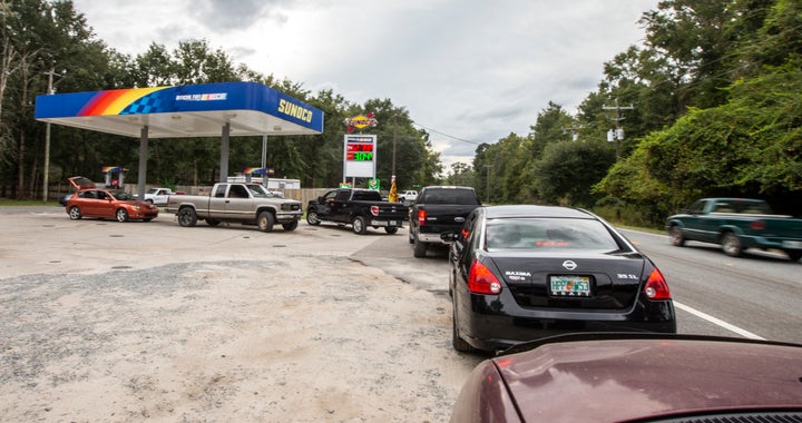 People line up for gasoline outside Tallahassee, Florida, on Monday as Hurricane Michael bears down on the northern Gulf coast.