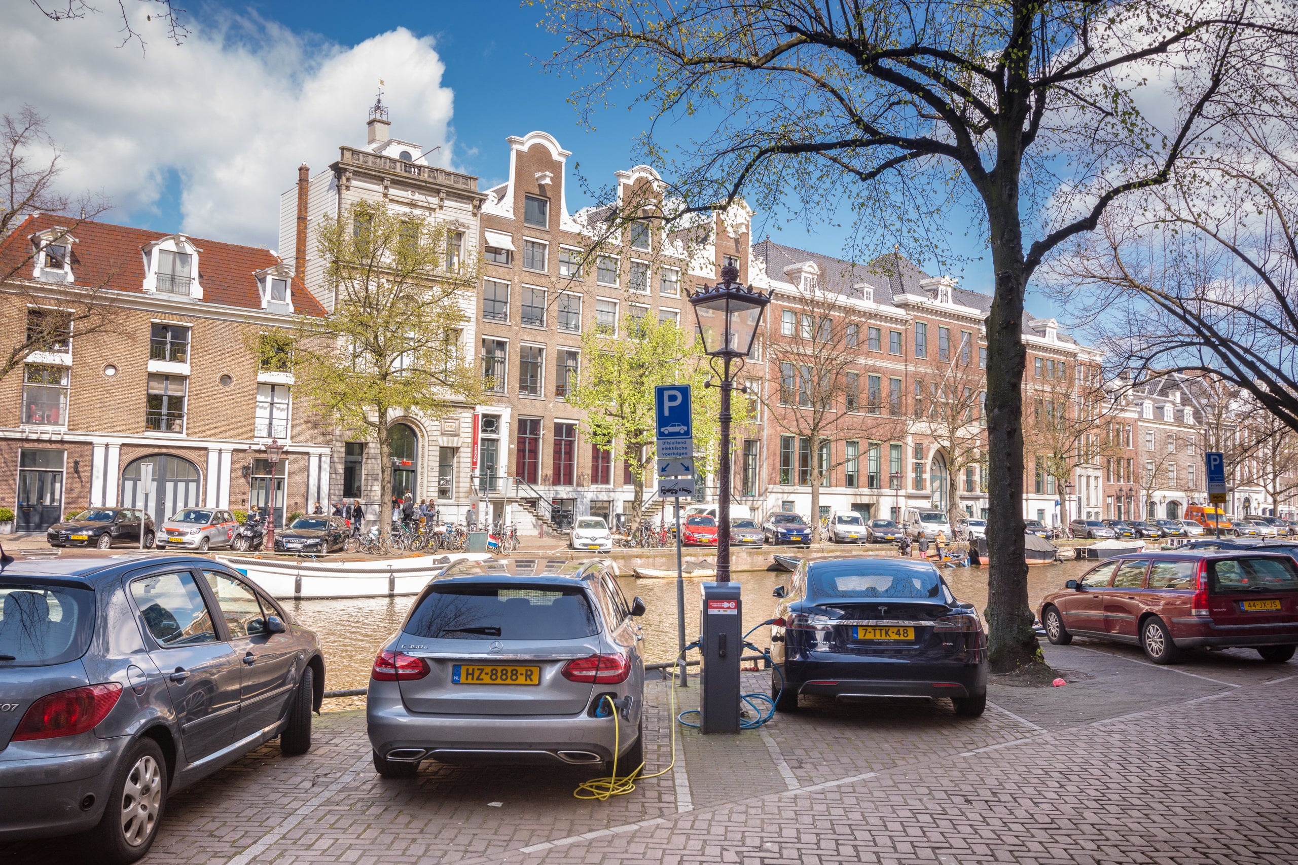 Electric cars at a charging station in Amsterdam.