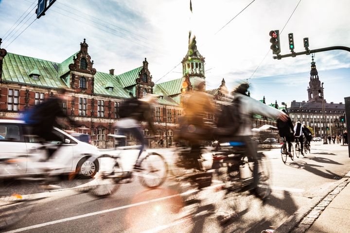 Commuters cycle in the center of Copenhagen, Denmark, which is frequently voted one of the most bike-friendly cities in the world.