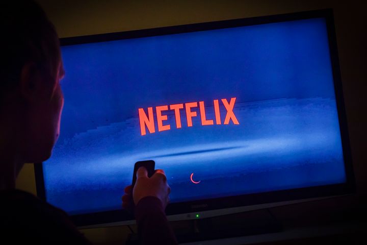 Netflix looking spooky in a dark room.